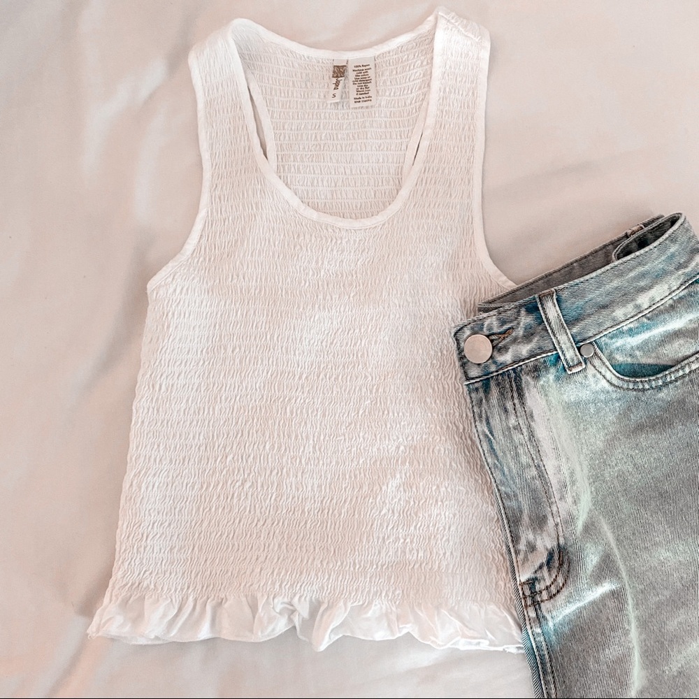 white tight-fitted ruffled tank top